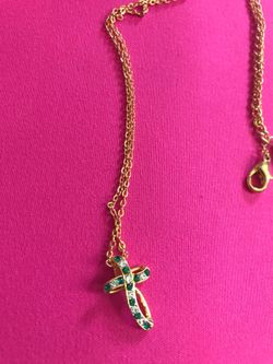 Gold plated cross detail emerald and diamond stones