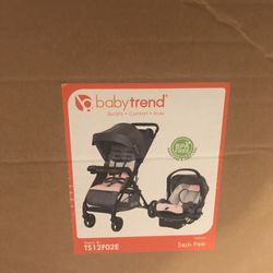 Baby car seat in the stroller it’s NEW THE BOX IS OPEN I GOT TWO FOR BABY SHOWER 