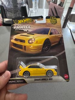 9 premiun hot wheels and 1 m2 machine