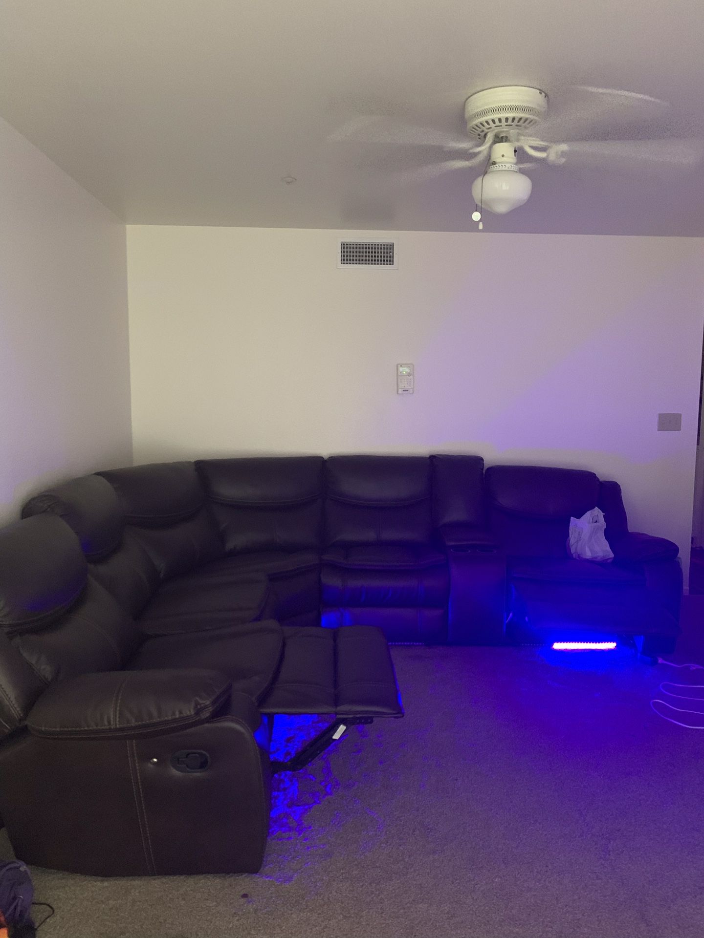 Sectional leather couch with LED lights