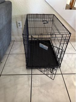 50$ OBO MEDIUM DOG CAGE