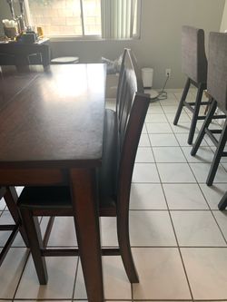 dinning table with bench with 4 chairs expands