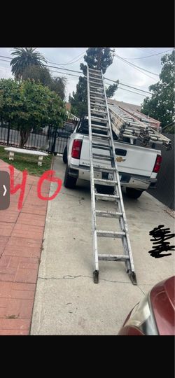 Good condition, 40 feet and more sizes available aluminum extension, Ladders