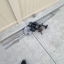 Large Bar And Smaller Bar With Some Weights 