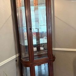 Oak and glass curio cabinet