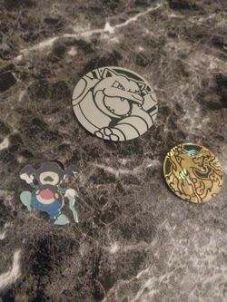 Pokémon coins and pin collectable