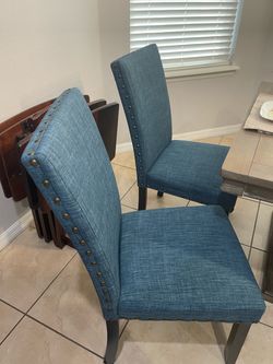 Six dining chairs $200