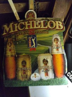 Neon light Michelob sign and a 90 100 bucks