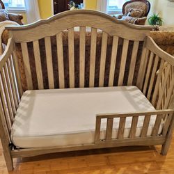 Beautiful Delta Farmhouse Crib with Toddler rail and changing table