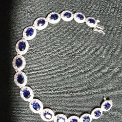 White gold and blue sapphire And diamond Tennis bracelet.