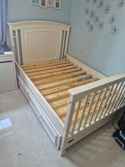 full bed with a twin bed underneath