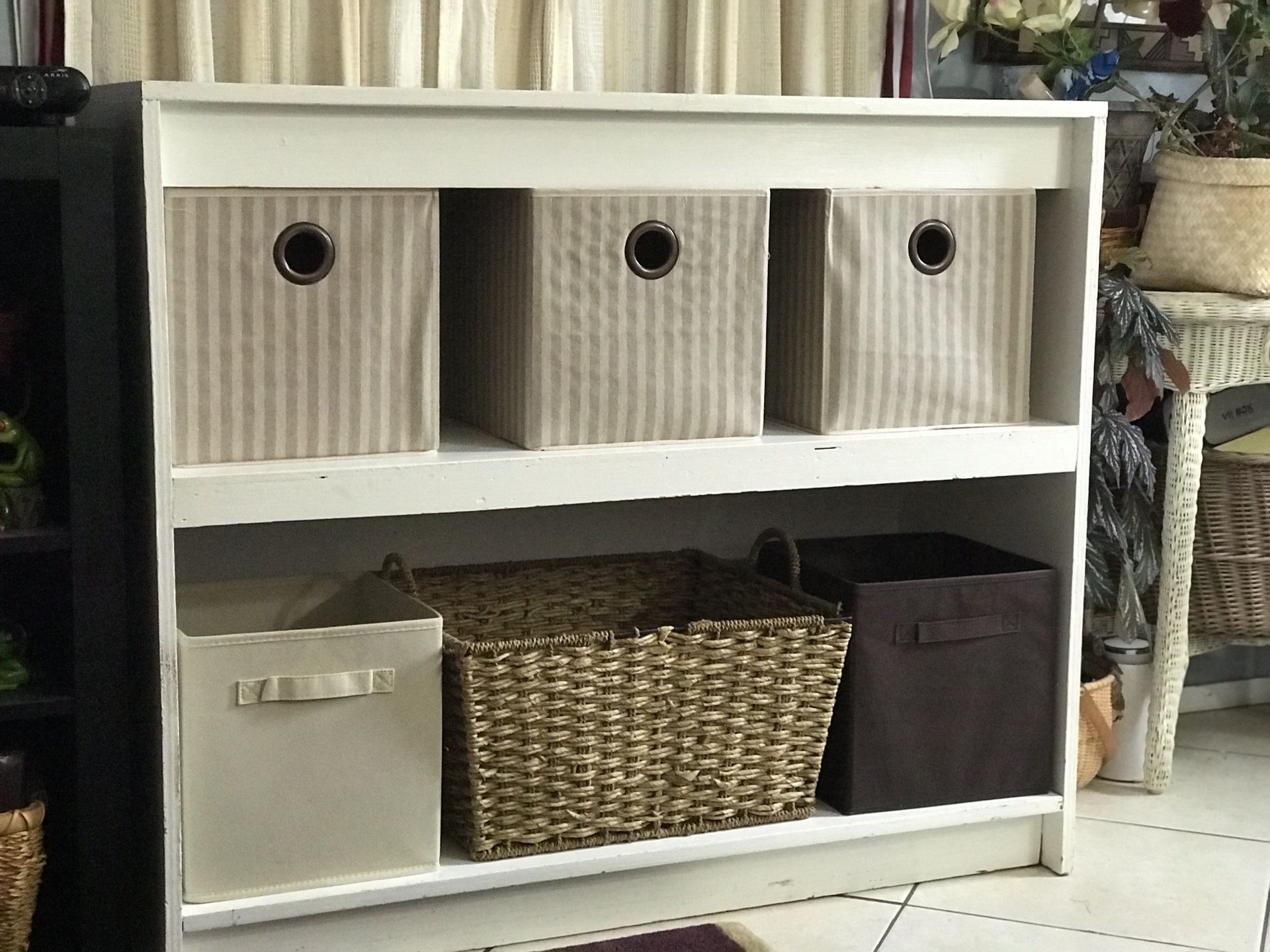 White rustic wood, storage shelves.