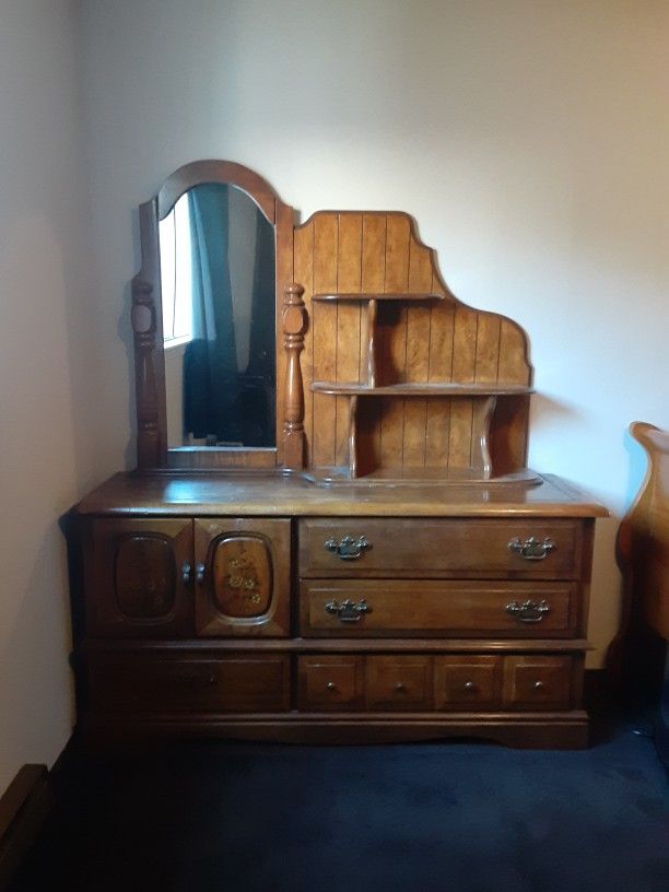 Antique wooden dresser with mirror