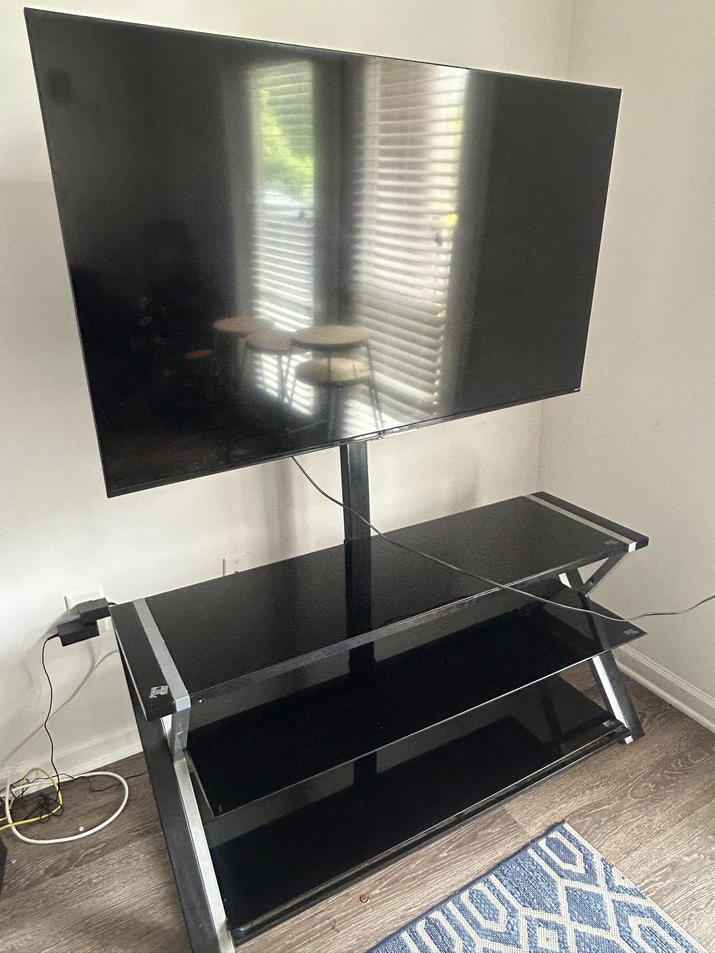 60 inch TCL with mounted stand