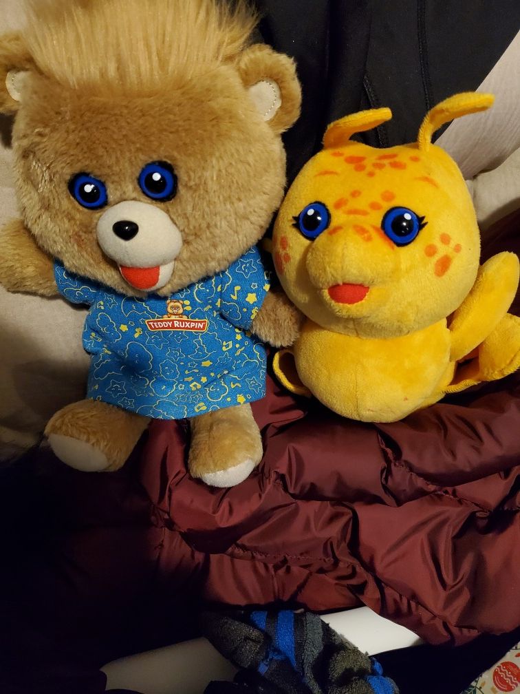 Teddy ruxpin and talking catapilar friend interact together