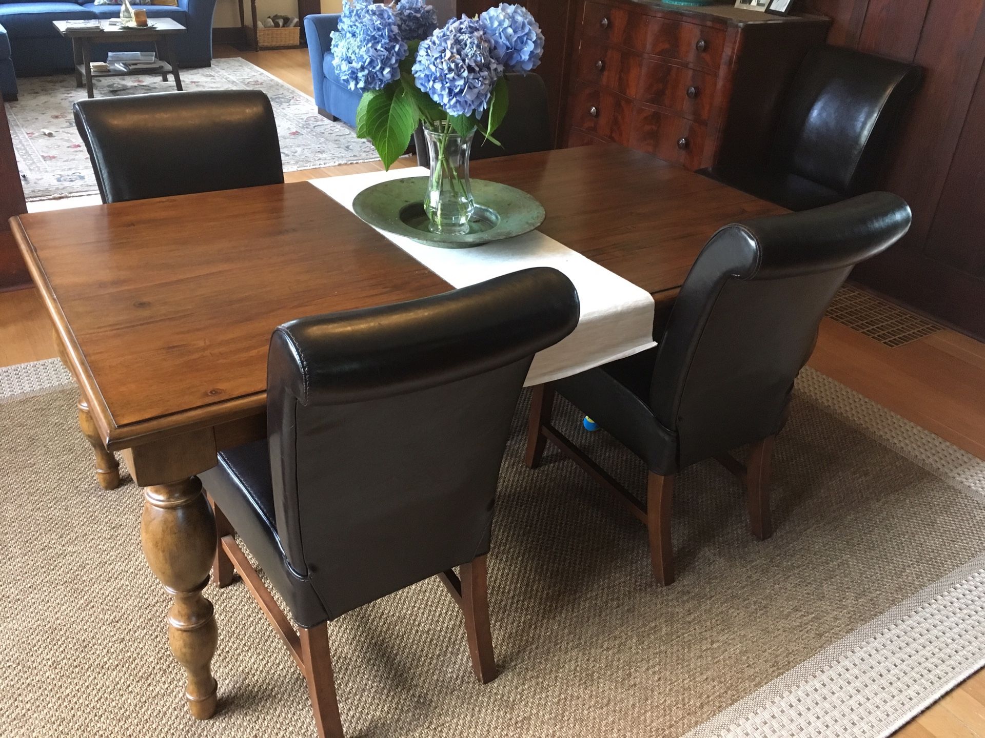 Set of four dining chairs. Dark brown