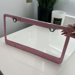 Pink bedazzled license plate frame