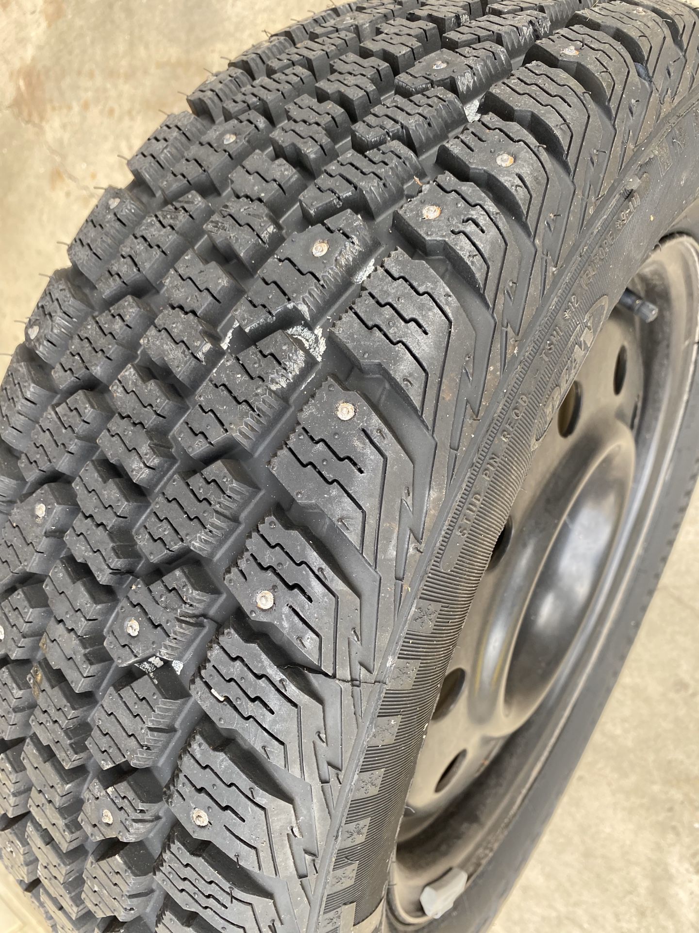2 205/60/16 Brand new studded snow tires.