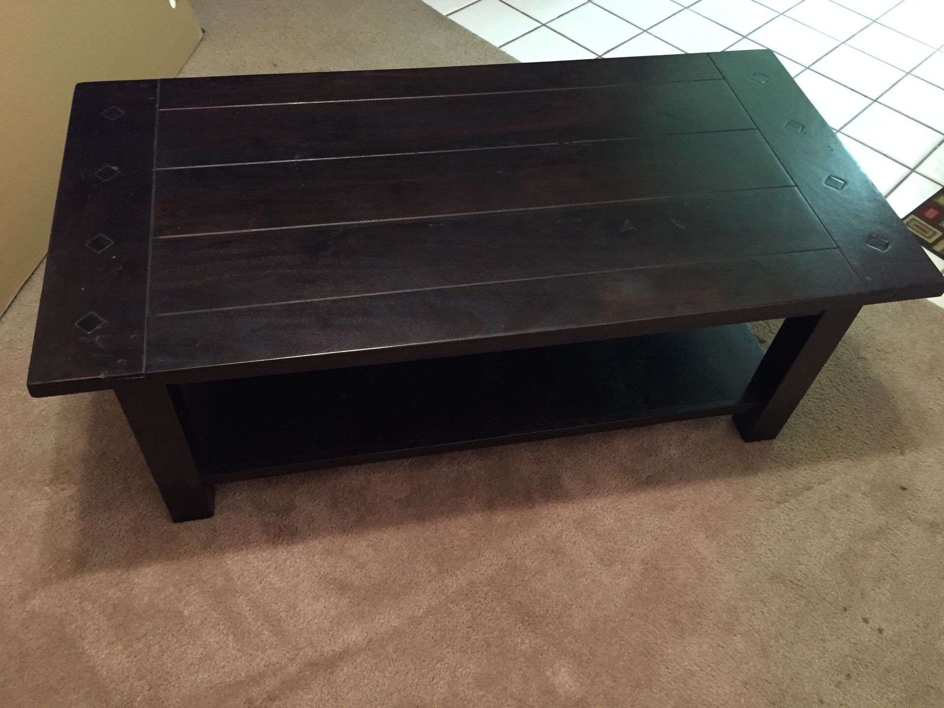 Living room table. Solid wood. Really heavy. Firm price. Purchased at pier 1 imports. 4ft x 2ft
