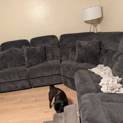 Gray Sectional With Reclining And Pop Up Sleeper 