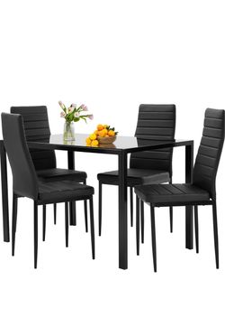 Black dining table with 4 chairs