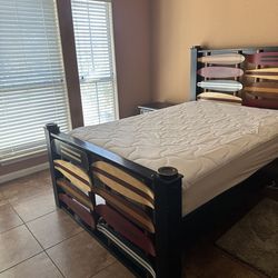 Full Side bed with mattress, night stand, dresser with mirror.