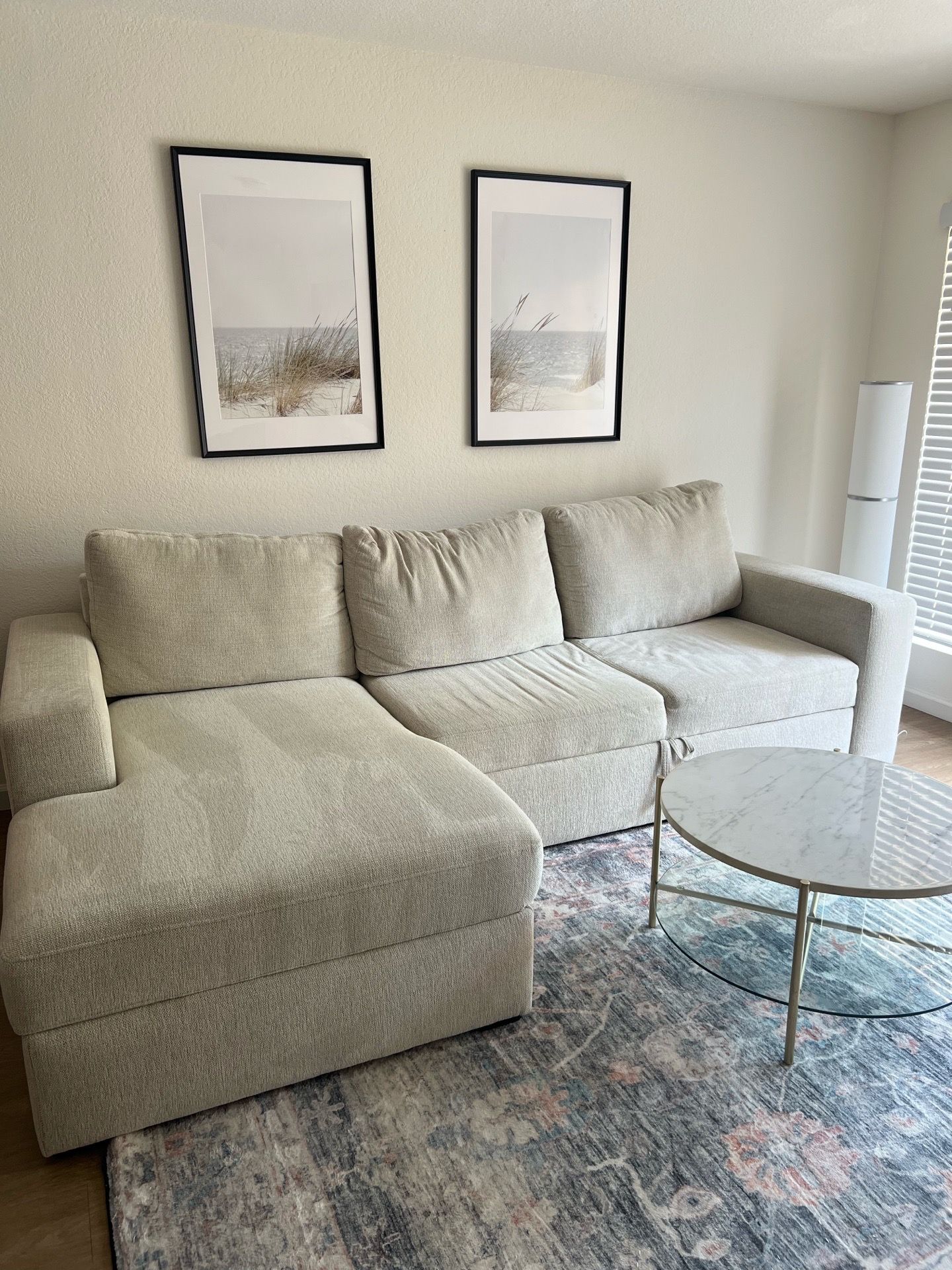 Cream beige sofa with sleeper and storage