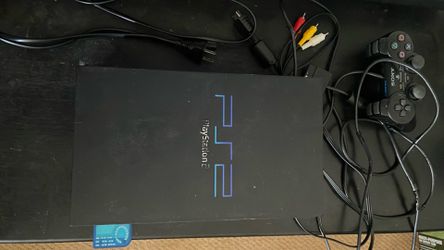PlayStation 2 with cords, memory card and controller