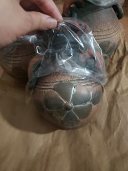 handcrafted clay pot with a flower design, Brown/ Copper