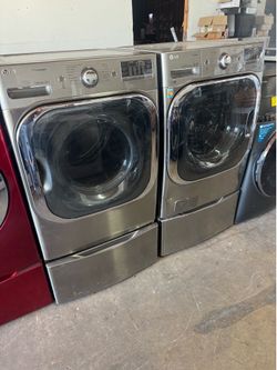 LG extra large capacity washer and dryer on pedestal with 90 day warranty only $799 for the Set