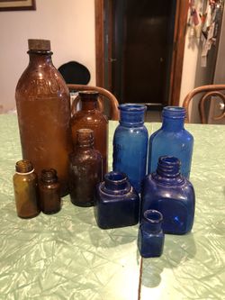 Antique miscellaneous glass bottles