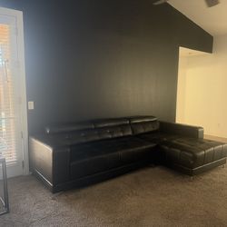 Black leather mid century modern sectional
