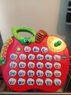 Preschooler apple v-tech computer