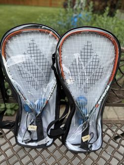 PAIR OF RACQUETBALL RACKETS.   BRAND NEW!!