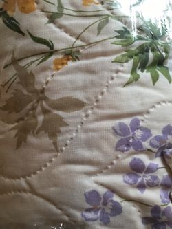 Quilt with curtains