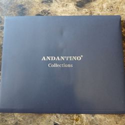 The product is a 100% pure mulberry silk square scarf designed for women, featuring a beautiful blue floral pattern on a black silk print. Measuring 2