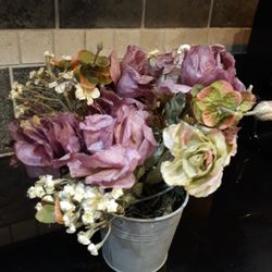 Flowers Inside A Pail
