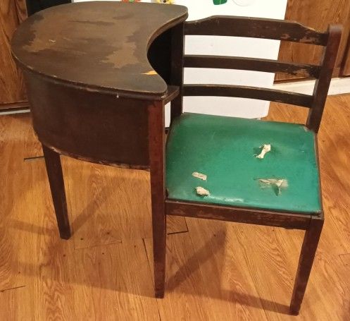 Vantage Telephone Desk With Chair Attached To It