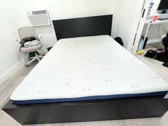 Queen Mattress with Dark Wood Bed Frame