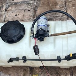 25 GALLON TANK EQUIPPED WITH A 12Volt 1.8 GPM PUMP SPRAYER