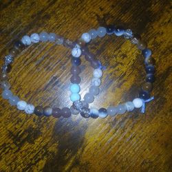 A pair of bracelets homemade.