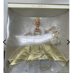 This is a Barbie Celebration Special Edition 2000 Holiday Doll in new in box.