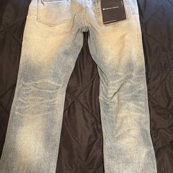 Purple jeans black tag