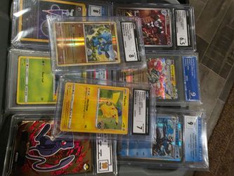 8 graded pokemon cards with