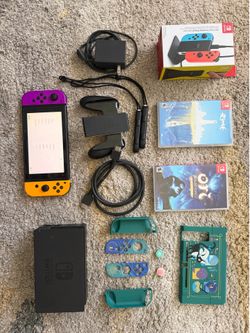 Nintendo Switch Bundle - Games, Joycon Charger, Shell, Thumb Grips