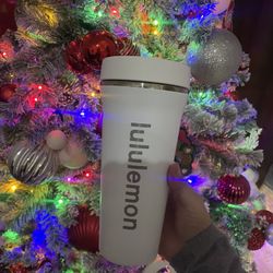 White Lululemon insulated tumbler with sliding lid. Keeps drinks hot or cold,  great condition