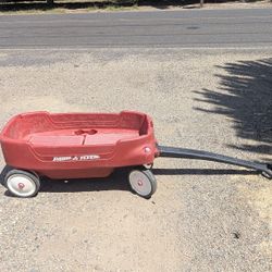 Radio Flyer Red Plastic Pull Wagon with Folding Seats and Seatbelts

