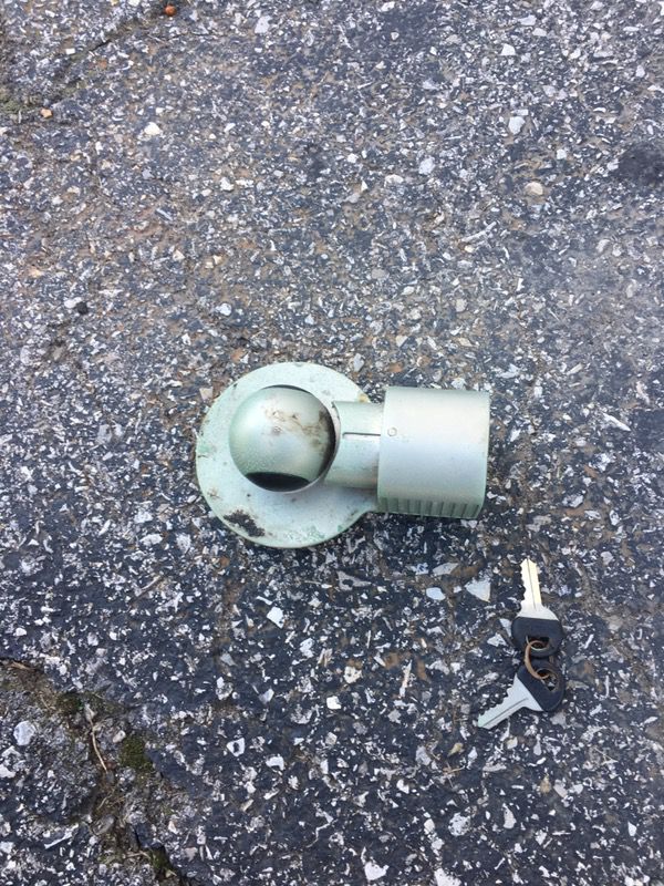 Lock for a trailer hitch ball