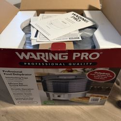 This is the packaging for a Waring Pro Professional Food Dehydrator (Model: WDHR60SILPC).