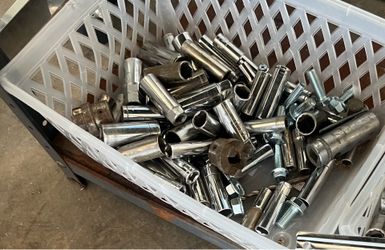 3 bins of standard and metric sockets.